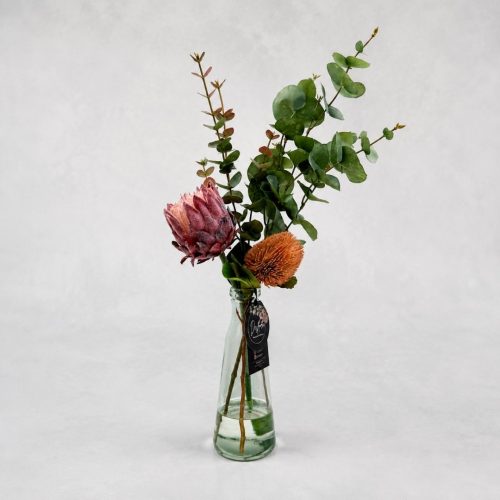Artificial Floral Arrangement Avalon with native flowers and eucalyptus in a tall glass vase with realistic artificial water by Desflora